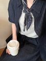 Dark blue denim outfit with a vintage floral silk scarf tied elegantly around the neck - Blue Floral