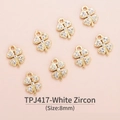 Detailed macro view of 8mm gold-plated four-leaf clover charms with white zircon inlay - Four-leaf Clover (8mm) / White