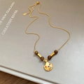 Detail of shell pendant with tiger eye beads and colorful crystals on a sweater chain - Shell Rhinestone Style (14#) / Gold