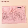 Close-up of dusky pink cashmere scarf showing fine tassel fringe and soft fabric texture - Dusky Pink