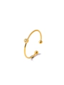 Macro detail of gold-plated minimalist open ring with round zircon and small ball accents - Light Yellow