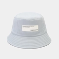 Detail of light blue canvas bucket hat featuring a white fabric label and stitched brim - M (56-58cm) / Light Blue