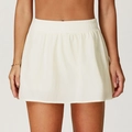 Gonna da tennis bianco crema da donna con elastico in vita e tessuto anti-uv - Taglia S / Colore albicocca chiaro