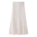 Detail of champagne satin midi skirt showing smooth silk texture and elegant A-line cut - XS / White