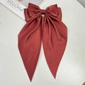 Elegant large red satin bow hair clip with long ribbons and a silky glossy finish - Brick Red