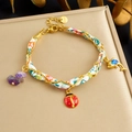 Bracciale in acciaio inossidabile dorato con nastro floreale e ciondoli animali - Stile Pietra Viola Delfino Coccinella (B1854)