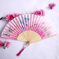 Pink bamboo folding fan with peach blossom print and matching decorative tassel - Pink Landscape & Peach Blossom Lady Fan Style 06