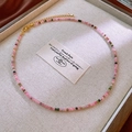 Macro detail of pink and green square stone beads on a textured jewelry tray - 7# Pink Square Style
