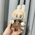 Green plush bunny costume for Labubu doll featuring brown overalls and handmade label - Dog Repair Kit / First And Second Generation Keychains Are Compatible With La Cloth Dolls. Dolls Not Included.