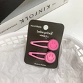 Set of two pink candy-colored smiley face hair clips for girls on a black card display - [21] Smile Face - Pink