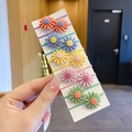 Set of 10 daisy elastic hair ties in vibrant colors for kids on a white display card - Sunflower 10Pcs Set