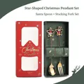 Detailed view of stainless steel Christmas spoons with star charms in a red and green gift box - 304 Star Pendant Santa + Sock (2PCS Set) / Gold