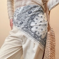 Elegant paisley print silk scarf worn as a stylish waist belt on neutral trousers - White Geometric Paisley Silk Scarf Waist Chain