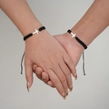 Pair of black woven friendship bracelets with silver cross pendants for couples - Black & White 2-Piece Set - Cross