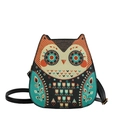 Crossbody bag with creative owl shape featuring colorful ethnic patterns and black strap - Green