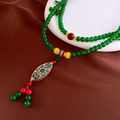 Ethnic style necklace with green ceramic beads and vintage bronze floral pendant - Ethnic Style/Emerald Green Beads