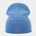 Close-up detail of light blue ribbed knit beanie featuring minimalist sun embroidery - Lake Blue