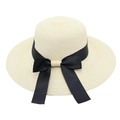 Close-up of beige woven straw sun hat featuring a large elegant black ribbon bow - Kids One Size Head Circumference 52cm / Cream