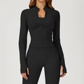 Conjunto de yoga negro sin costuras con chaqueta de cuello alto y leggings con orificios - XL / Negro Premium