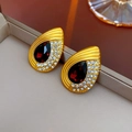Detail of vintage gold teardrop earrings with a red gemstone and sparkling rhinestones - 16# Silver Earring Post - Gold Coffee