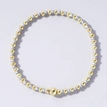 Minimalist elastic bracelet with alternating polished gold and matte silver beads - Gold and Silver Two-tone