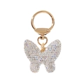 Primer plano de un llavero de mariposa dorado con cristales brillantes y pedrería - Plateado
