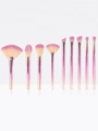 Set di 9 pennelli da trucco con sfumatura rosa e manici metallici su bianco - Set da 9 pezzi