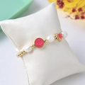 Beaded natural freshwater pearl bracelet with pink smiley face and star enamel charms - Pink Gold