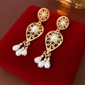 Detail of gold hollow leaf earrings with pearls on red velvet jewelry box lid - 15# Hollow Pearl Tassel (15# S925 Post-Gold-White)