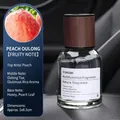 Peach Oolong car aromatherapy diffuser in 160ml glass bottle with wood grain cap - Small Time - Peach Oolong