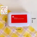 White tin storage box with red medical cross logo and cute cartoon rabbit stickers - 1# Portable Pill Box (With Stickers)