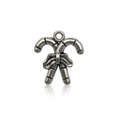 Detailed macro of antique silver alloy candy cane pendant with a festive bow for DIY jewelry - Christmas Cane Type B