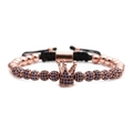 Close-up of rose gold crown bracelet with micro-pave blue cubic zirconia and black cord - Blue Zirconia Rose Gold Crown Bracelet