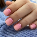 Short square press-on nails with pink ombre glitter design shown on a hand - Pink Gradient (with Yellow Jelly Glue)