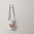 Close-up of a white quilted fabric water bottle bag with a cute brown plush bear - White/Milk Tea Bear