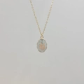 Golden stainless steel necklace with blue resin oval pendant and leaf engraving - Green Strawberry Quartz-Leaf