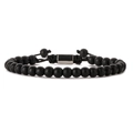 Detailed close-up of matte black volcanic stone beads and metal plaque on woven bracelet - 6mm Matte Black