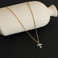 Detail of gold cross pendant with baguette-cut zirconias on a fine stainless steel chain - Gold-Style B-Baguette Zircon
