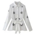Witte damesblouse met lange mouwen, kralenpatroon en strikceintuur in de taille - XS / Wit