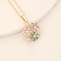 Detail of gold circular pendant with pink, purple and green zircon flower inlay - Hollow Round Flower Pendant (5# Flower)
