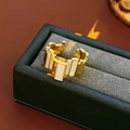 Detailed close-up of gold plated ring with rectangular white enamel and zircon accents - Gold (Real Gold Plated)