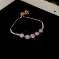 Detail of rose gold flower bracelet with pink zircon stones and adjustable pull chain - 29# Rose Gold Pink Zircon Flower Style