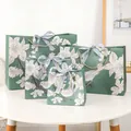 Dark green gift bag set with white cherry blossoms and blue silk ribbon in four sizes - Small (18x16x10cm) / Silver Ribbon