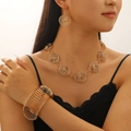 Three-piece golden jewelry set with spiral geometric necklace, earrings, and cuff bracelet - Gold (KC Gold Necklace + Bracelet + Earrings)