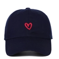 Close-up of a navy blue baseball cap with a detailed red heart embroidery on the front - Red Heart Embroidery / Navy Blue
