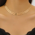 Close-up of a gold chunky choker necklace on model skin with rectangular polished links - Wide Choker Necklace (Gold)