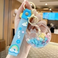 Blue liquid quicksand keychain with a rabbit figurine inside a moon shaped pendant - Star Moon Rabbit - Blue