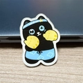 Cartoon black cat acrylic brooch featuring boxing gloves and blue shorts on desk - Boxer Black Cat