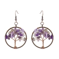 Close-up of handmade tree of life earrings with purple crystals and copper wire wrap - Antique Copper + Amethyst