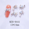 Detail of silver bow nail charm with AB heart crystal and 13x14mm size reference - Silver Bowknot Aurora AB Heart(9441)